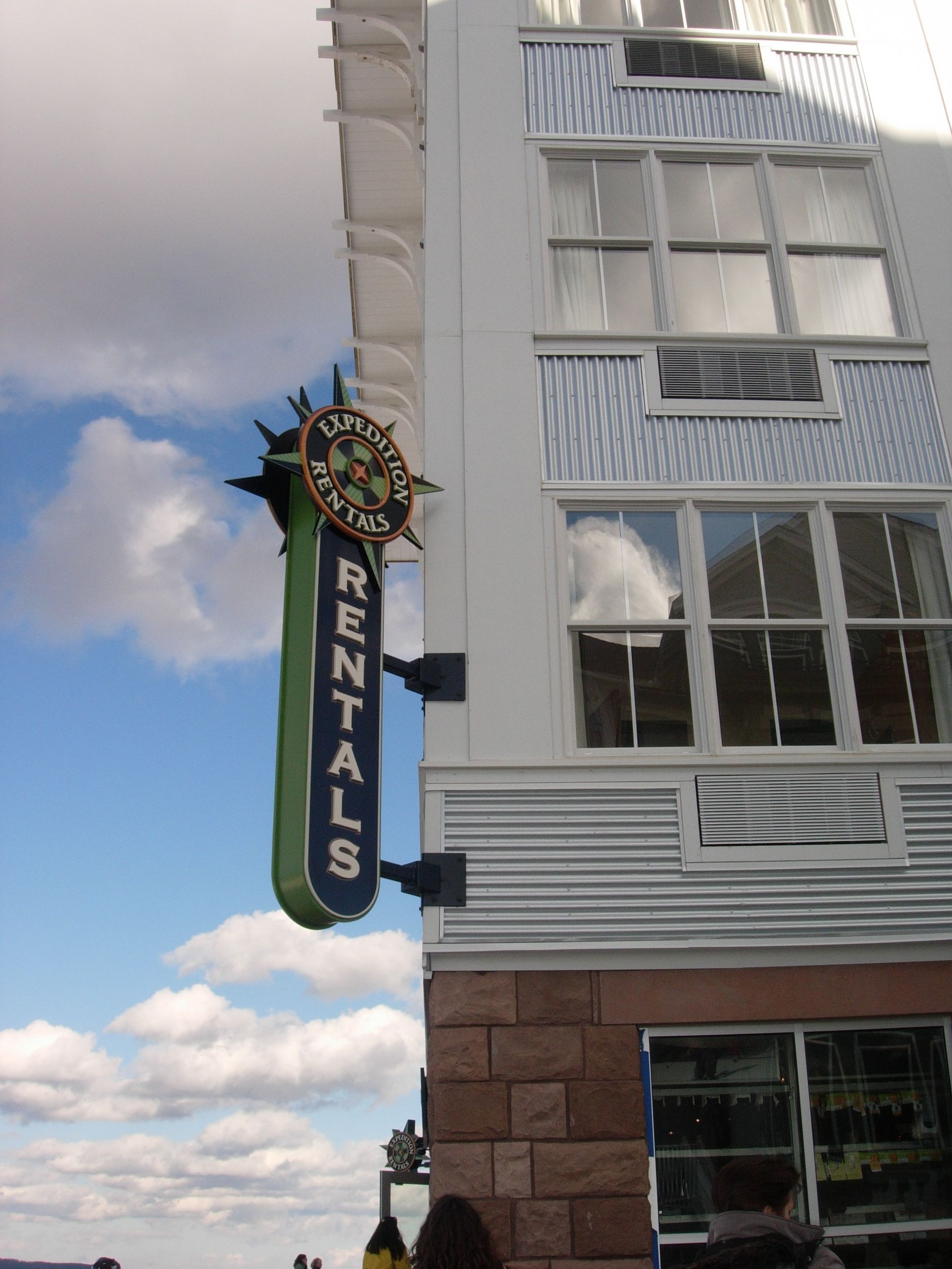 A building with a sign that says rentals on it