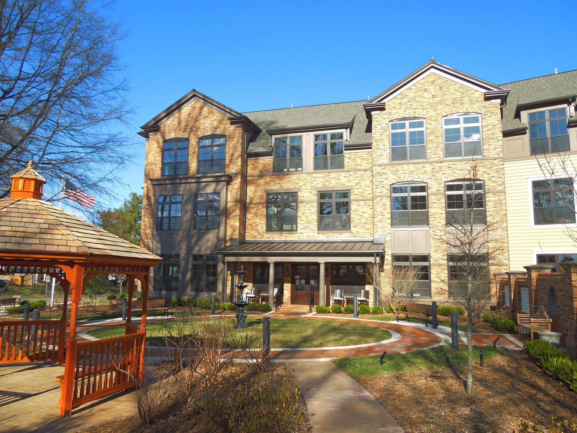A large building with a gazebo in front of it