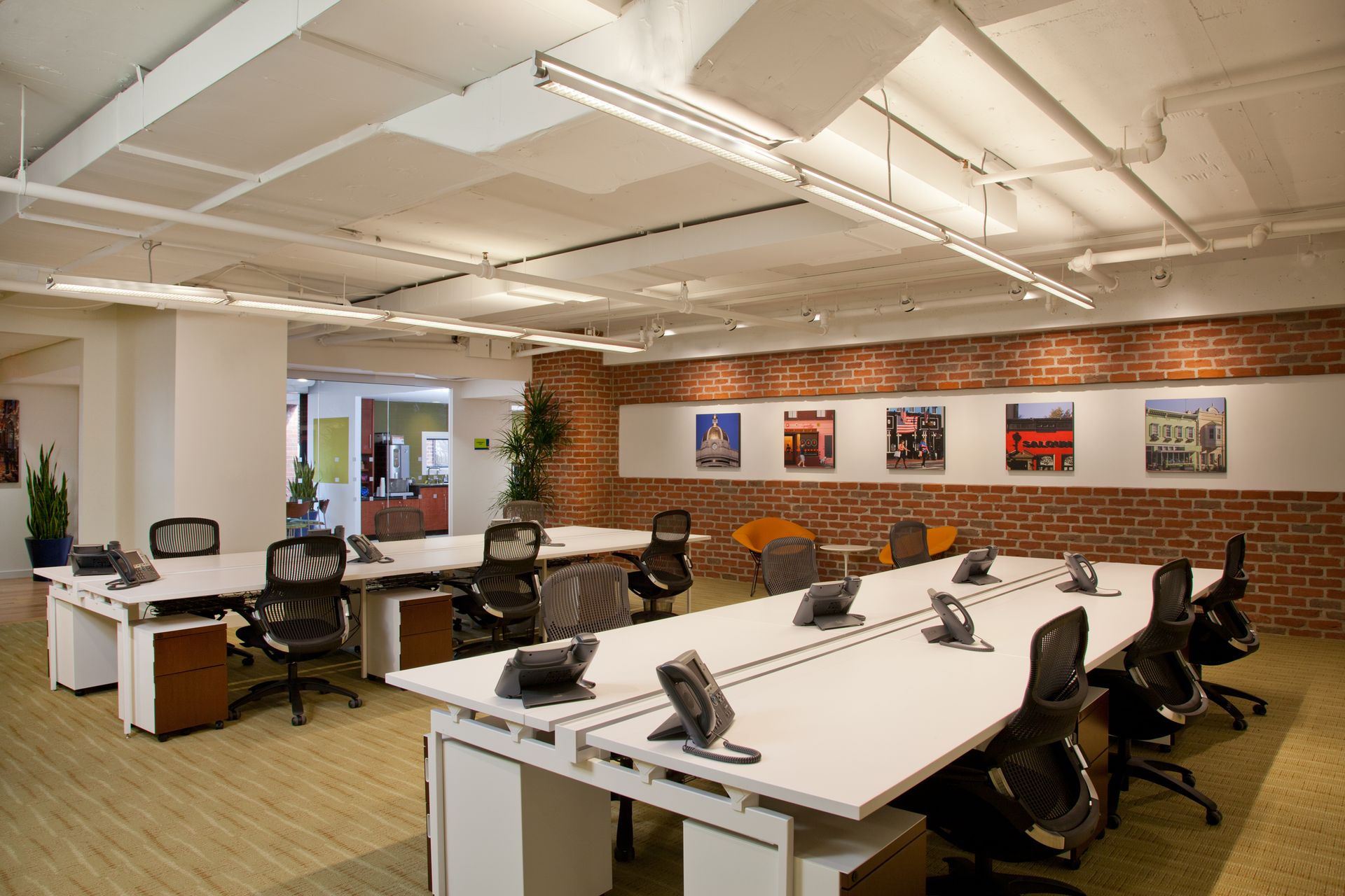 A large office with a lot of desks and chairs
