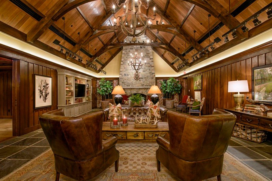 A living room filled with furniture and a fireplace