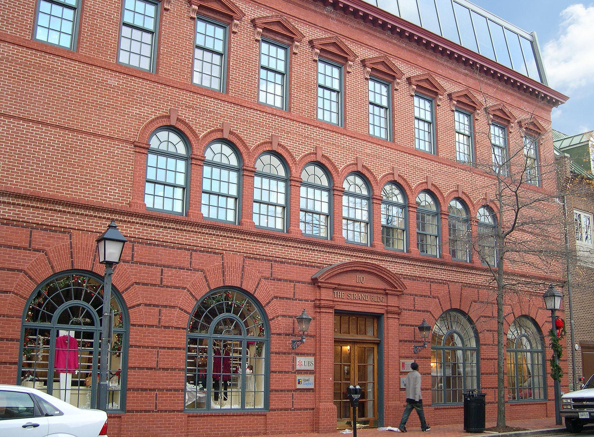 A large brick building with a lot of windows
