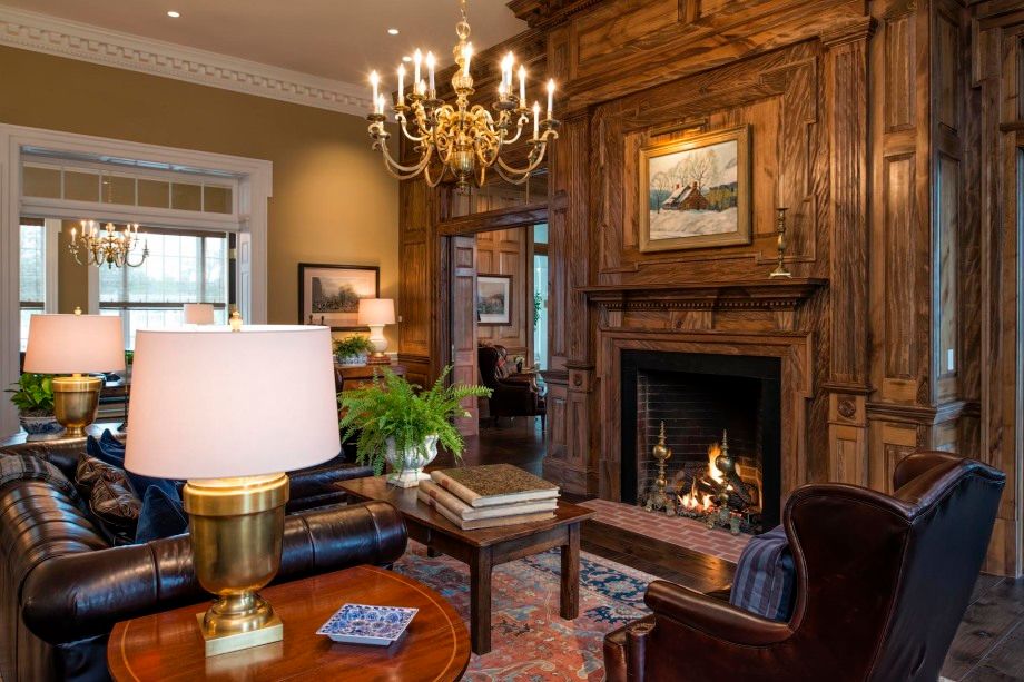 A living room filled with furniture and a fireplace.