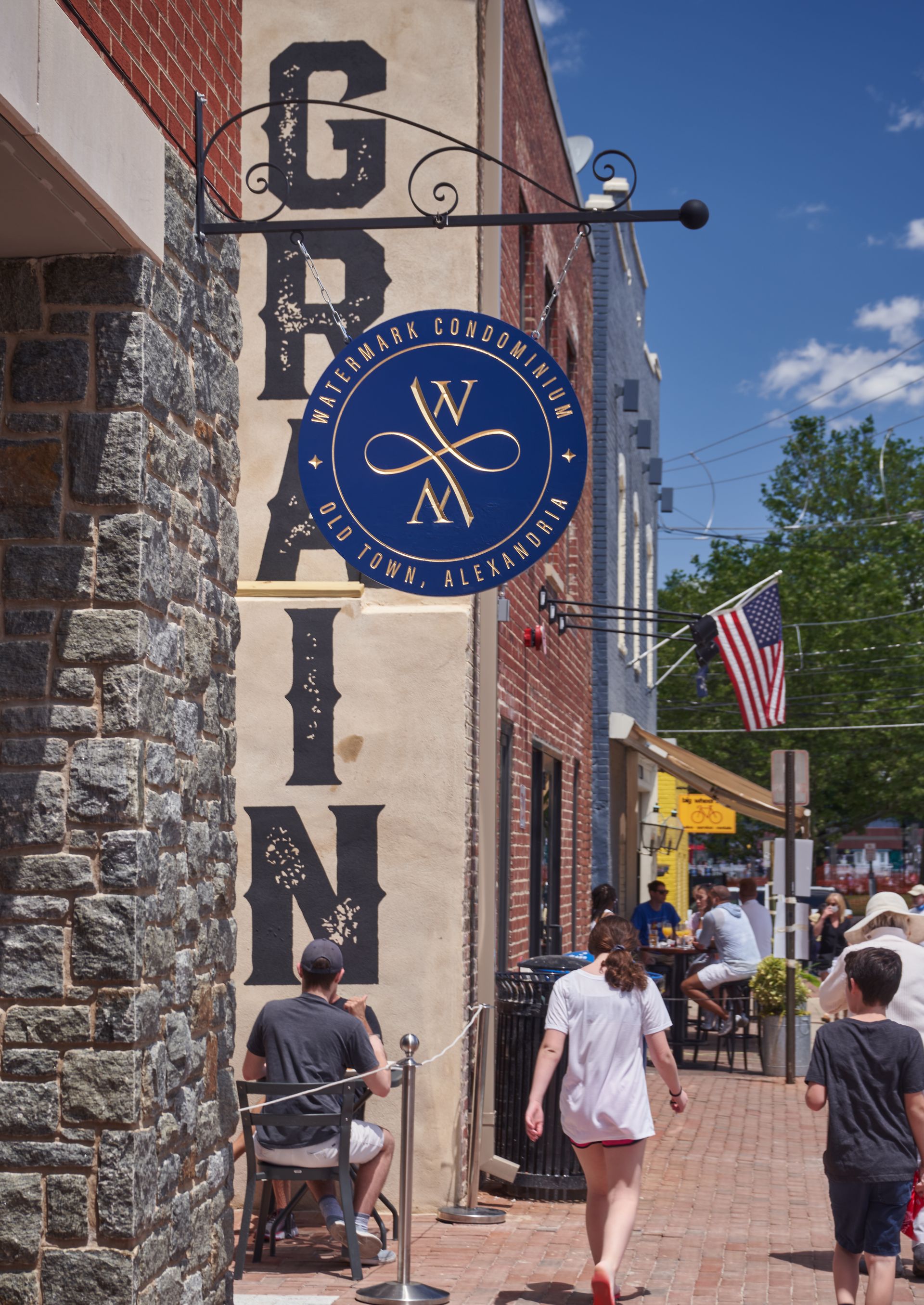 A sign on the side of a building says grain