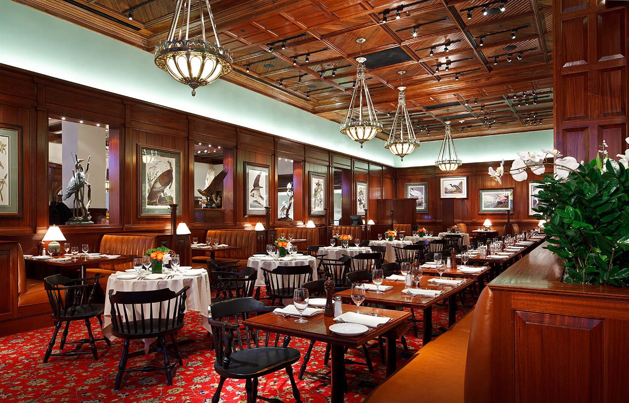 A large dining room filled with tables and chairs
