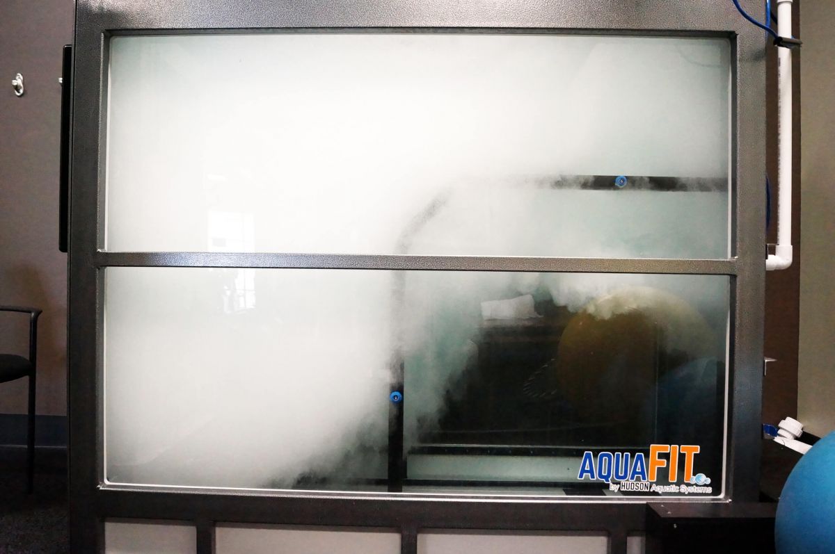 A large window with the word aquafit on it