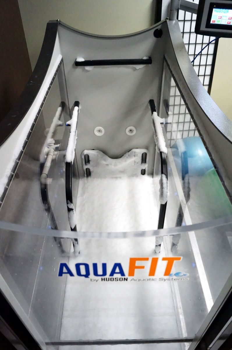 The word aquafit is on the side of a machine