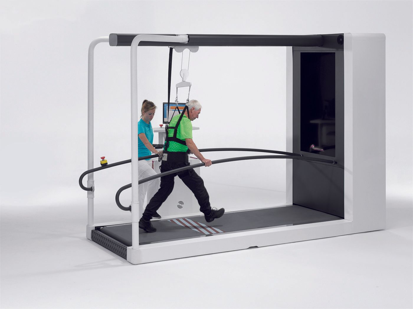 A man and a woman are walking on a treadmill.