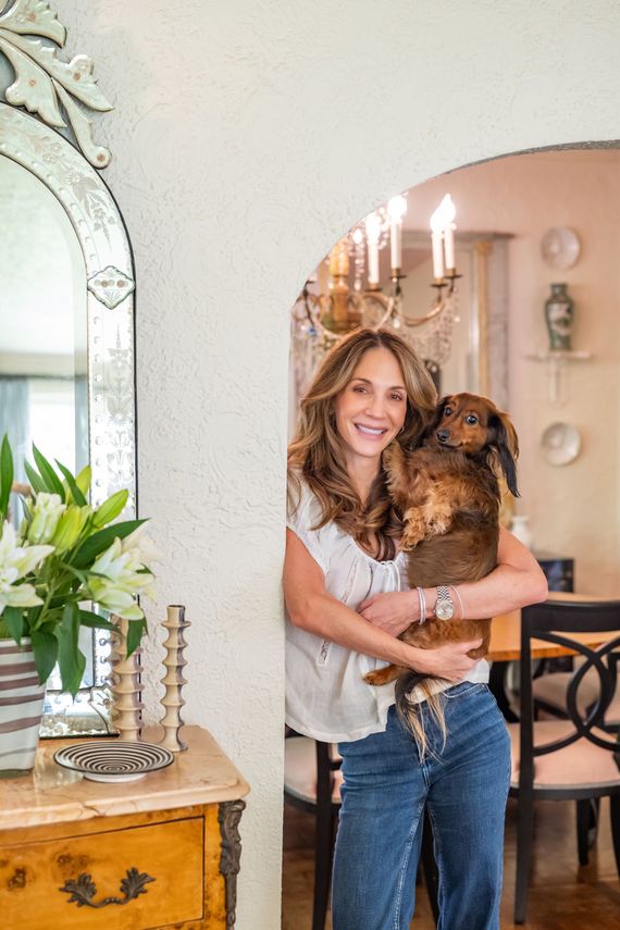 Carrie Kidd holding her dog hazel