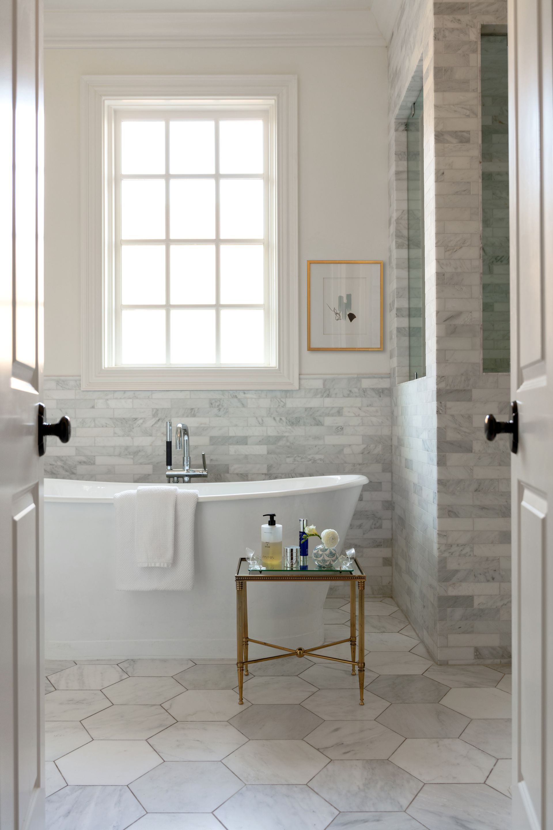 White, peaceful master bathroom