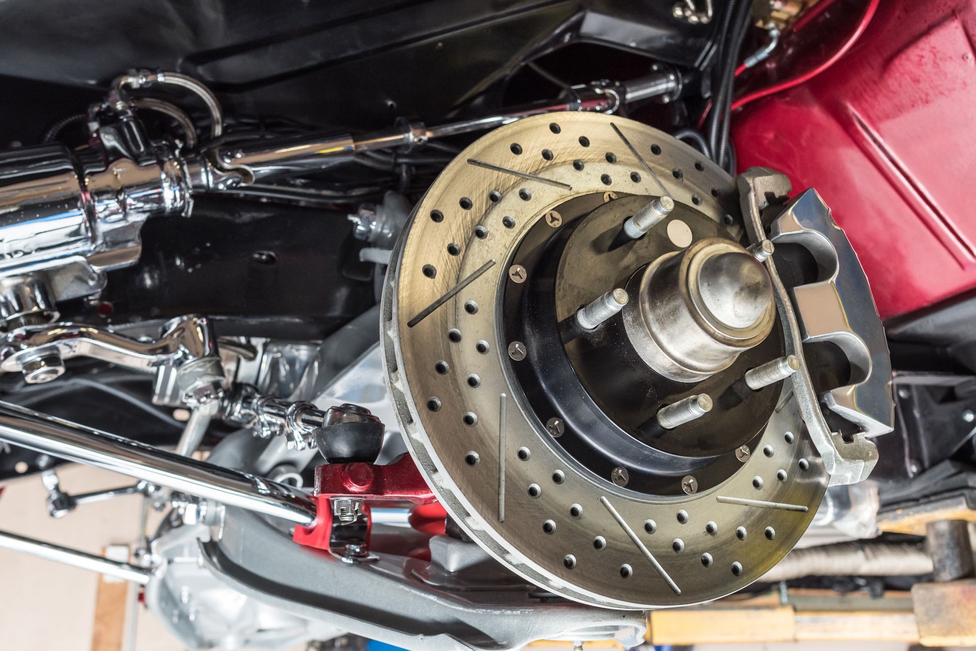 A close up of a brake disc on a car.