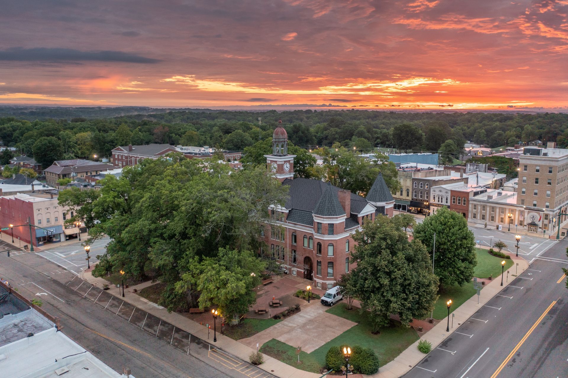 An aerial view of a small town at sunset.