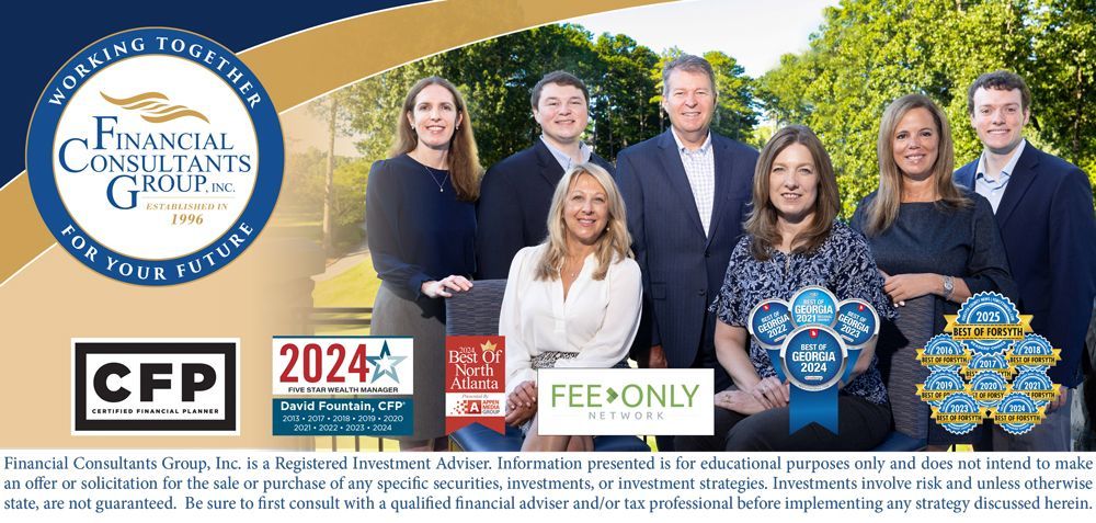 A financial services company team stands together with blue and gold branding and awards.