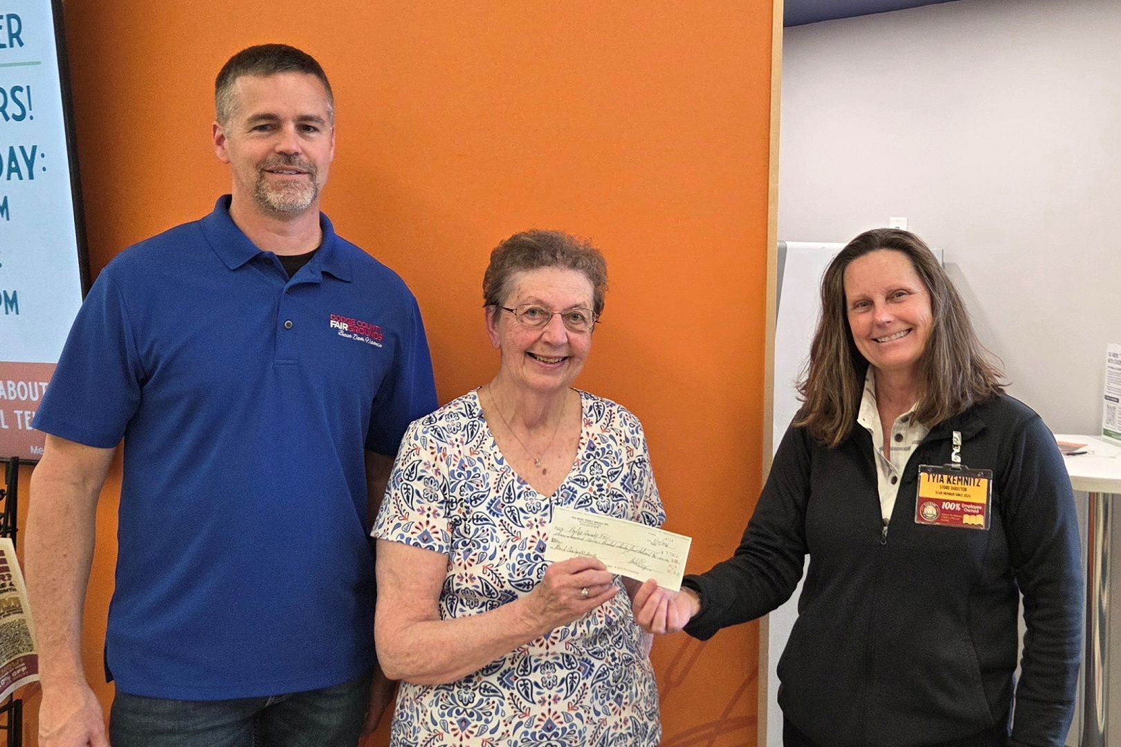 Tyia Kemnitz, of the Mayville Piggly Wiggly location, proudly presented the donation