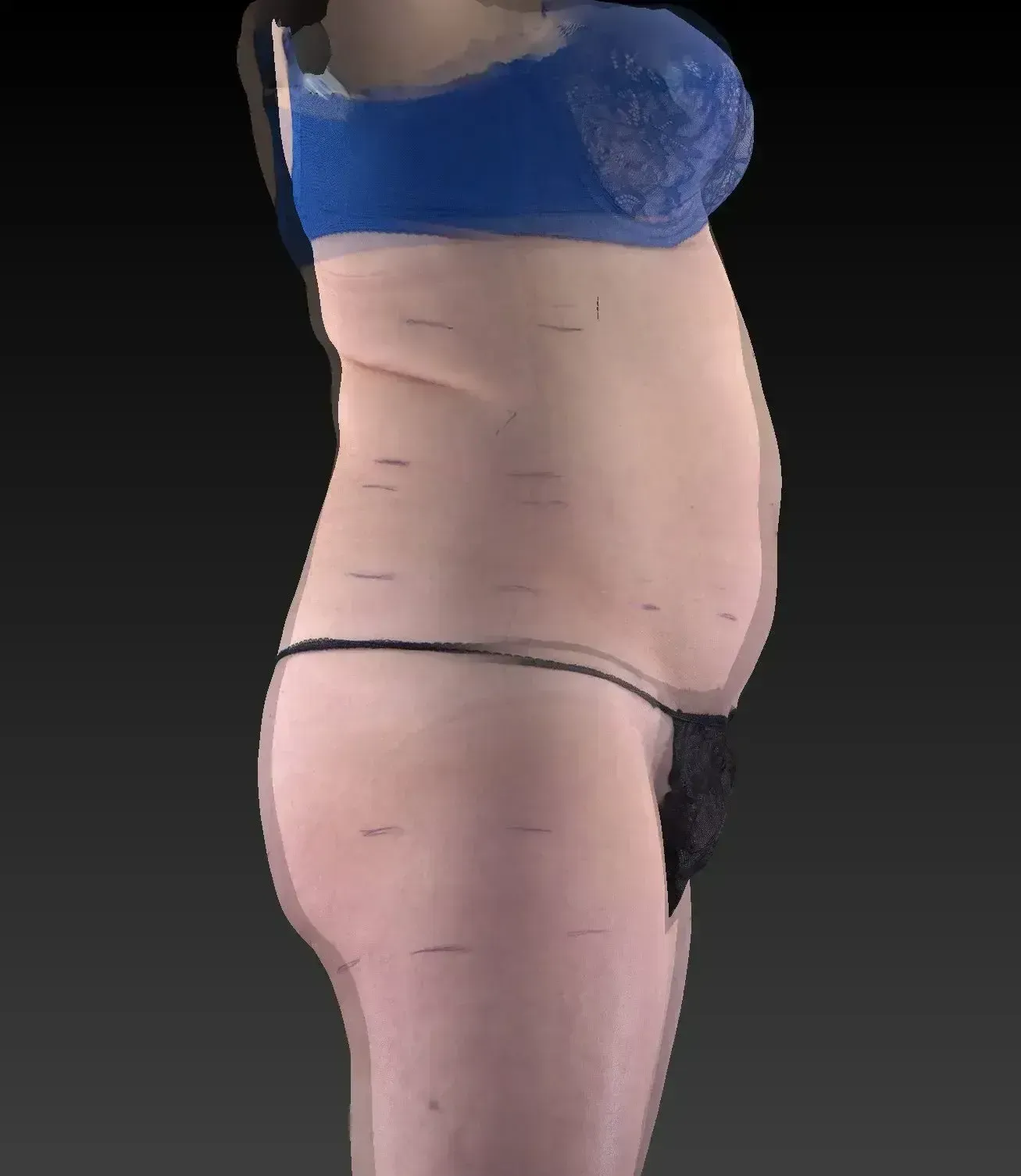 Side view of a person wearing a blue lace bra and black underwear, showing their torso.