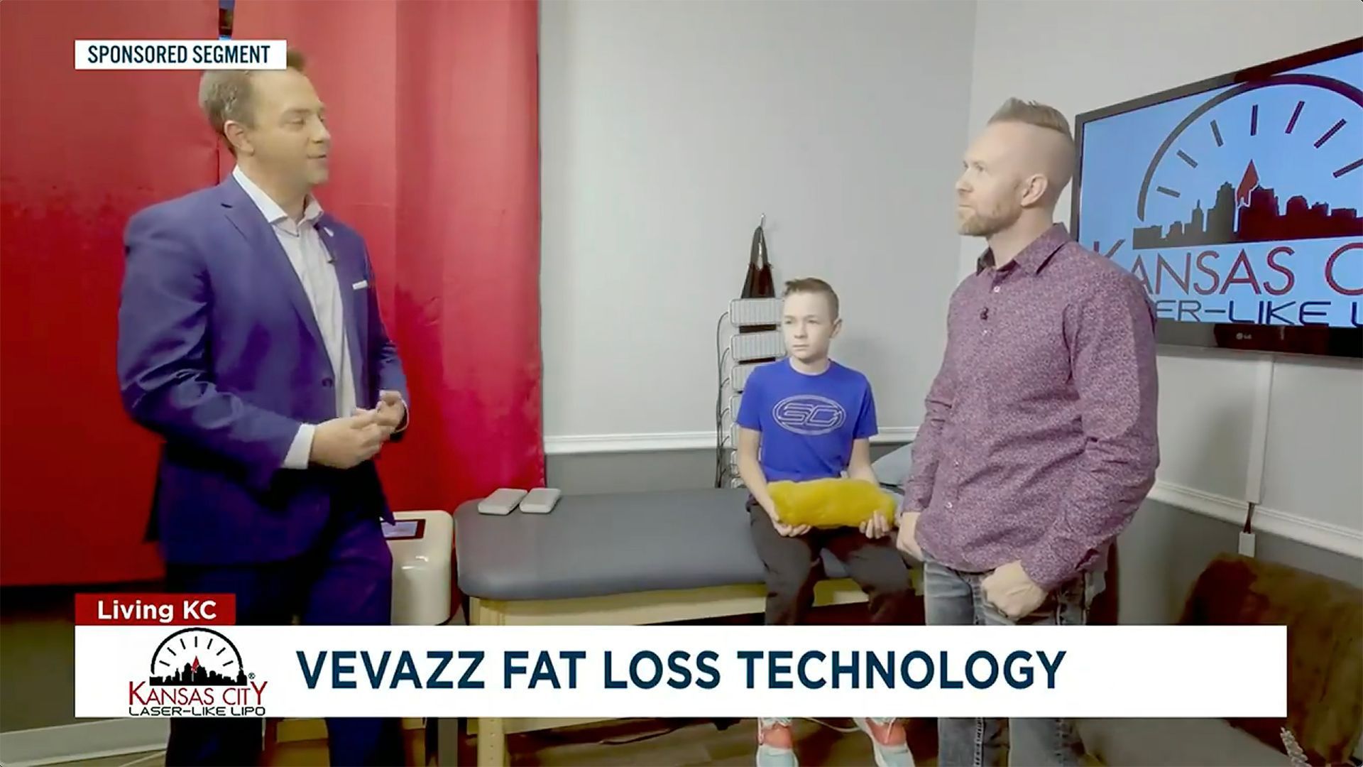 A news segment with three people in a room; the topic is 