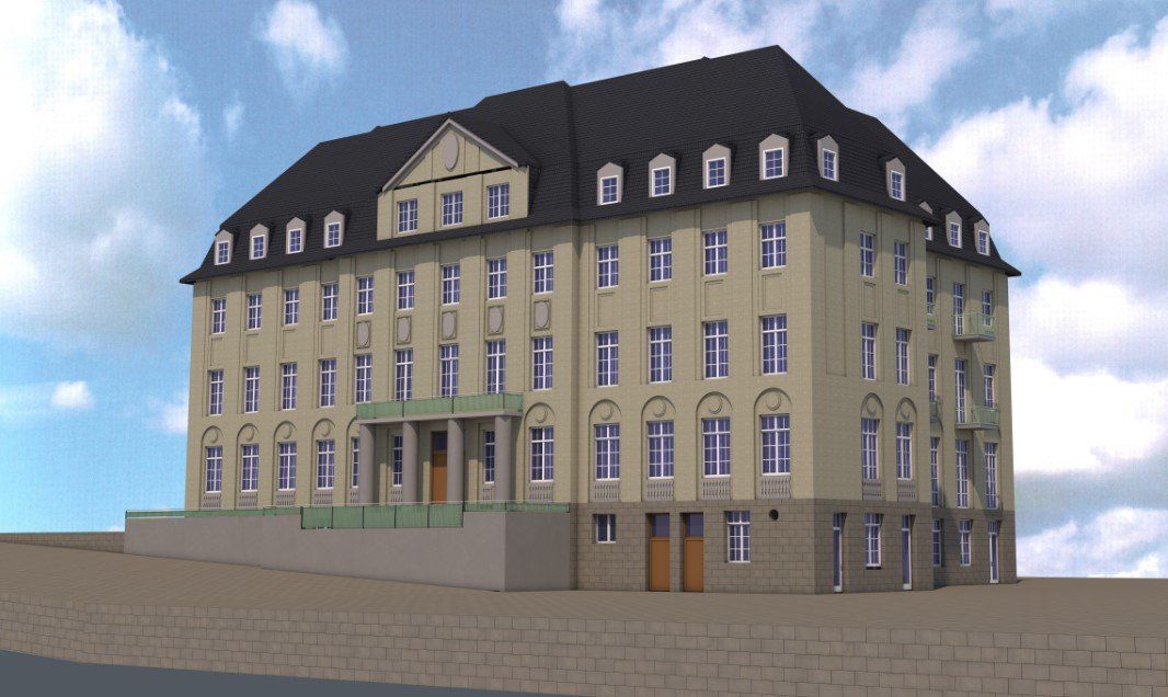 Ein großes Gebäude mit einem blauen Himmel im Hintergrund