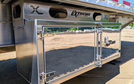 Shiny metal storage compartment on a trailer. 
