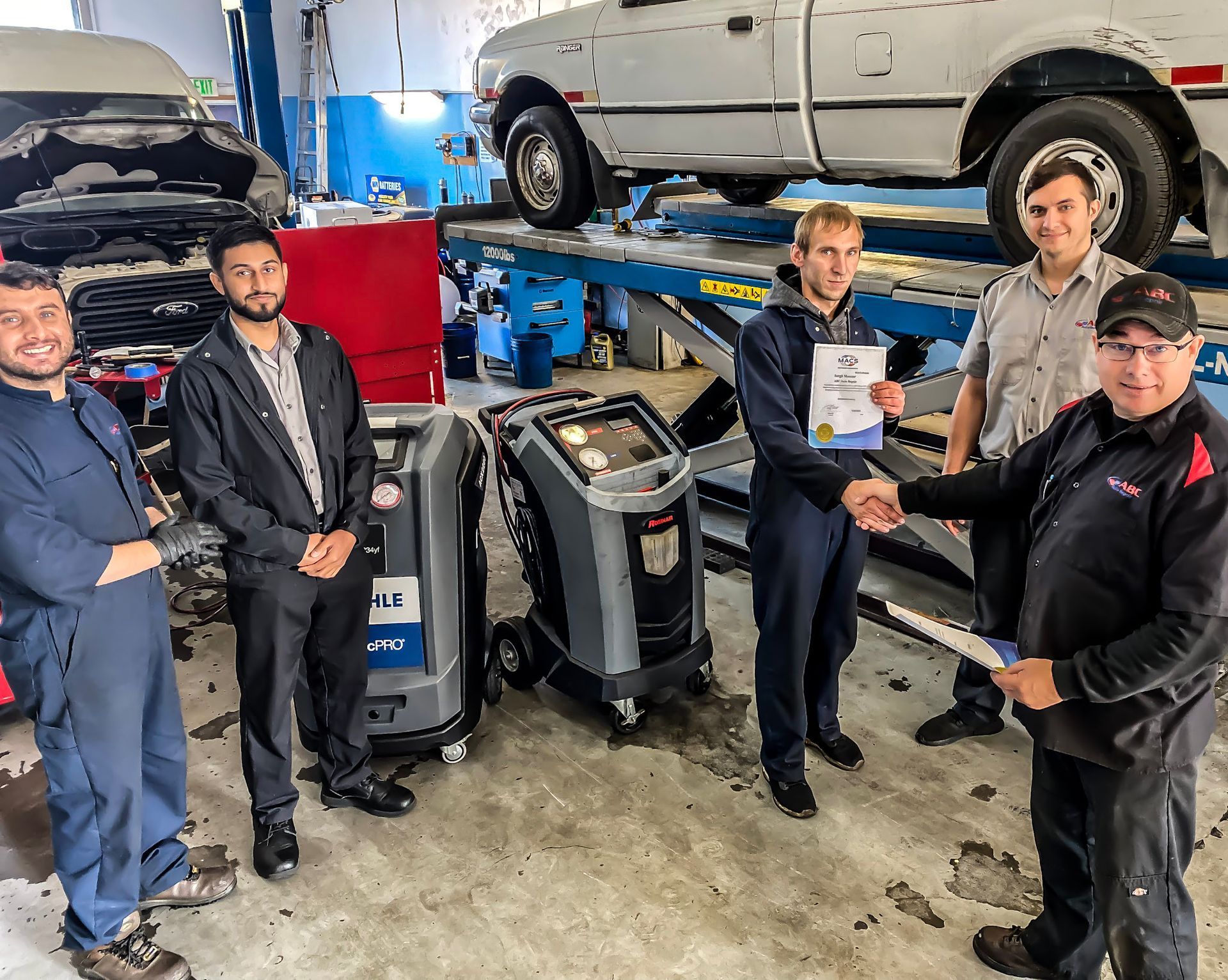 ABC Auto Repair team in Burien earning A/C service certifications