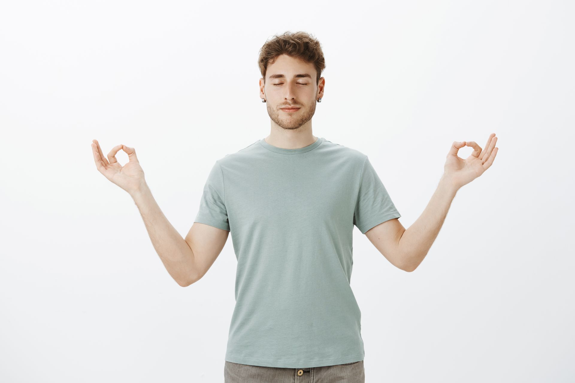 A young man practicing mindfulness techniques