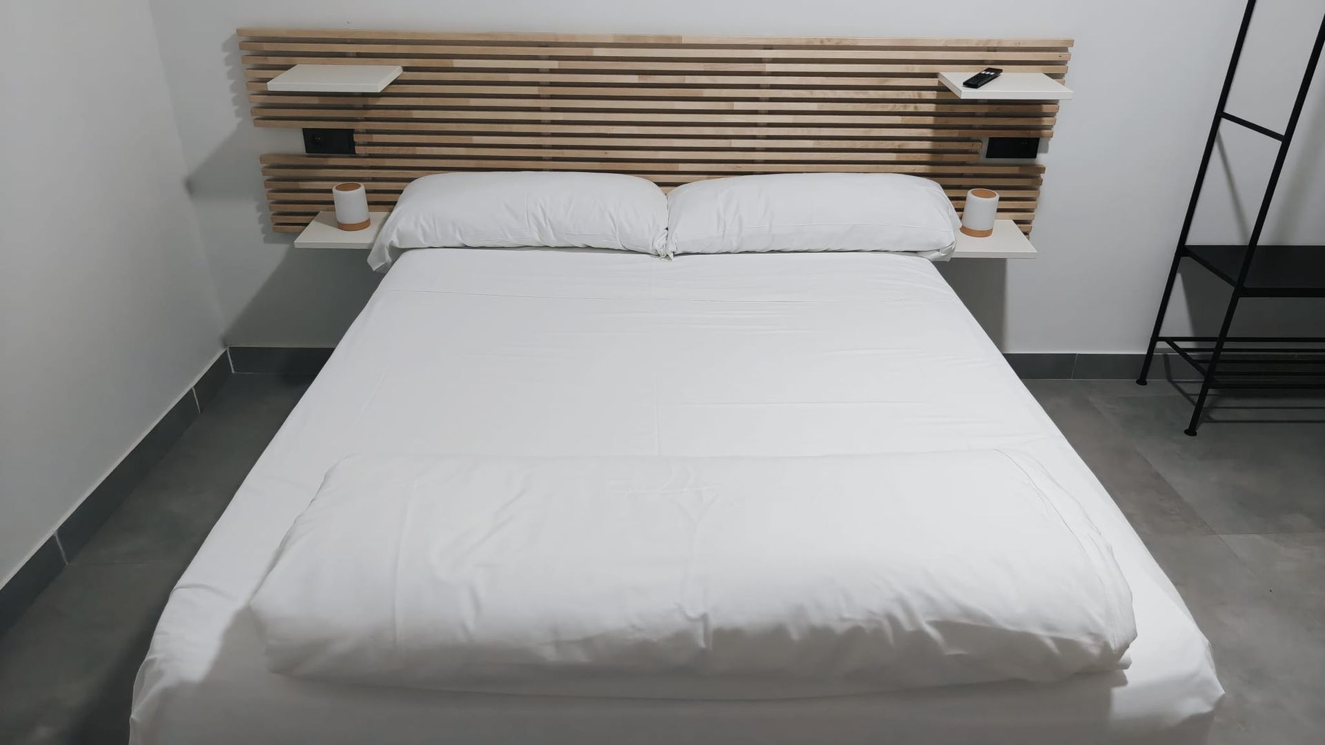 Close-up of the bed in the NIXBED ACCESS accessible room at Nixar Hostel
