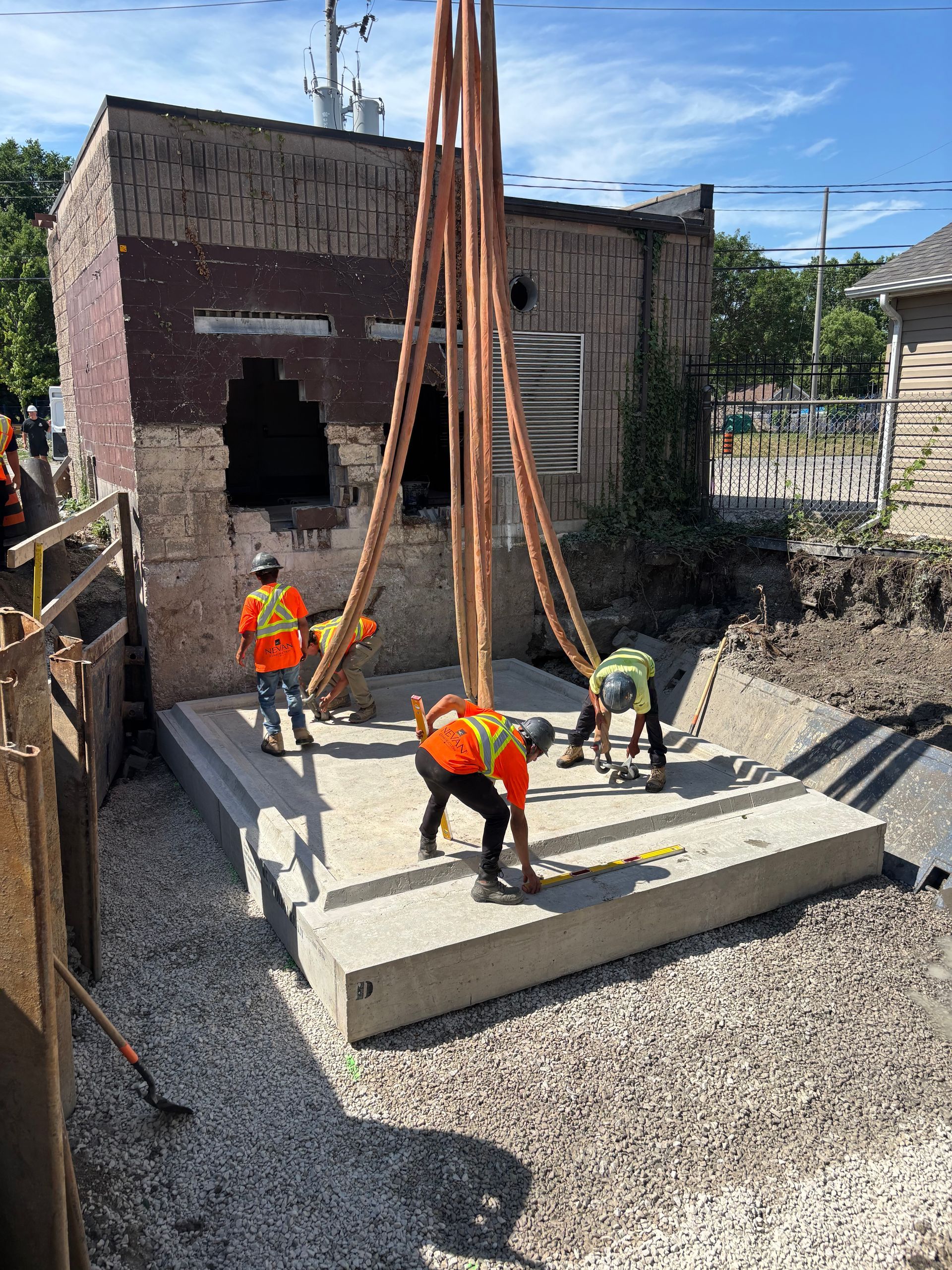 Coldstream Concrete employees working on installing precast concrete.