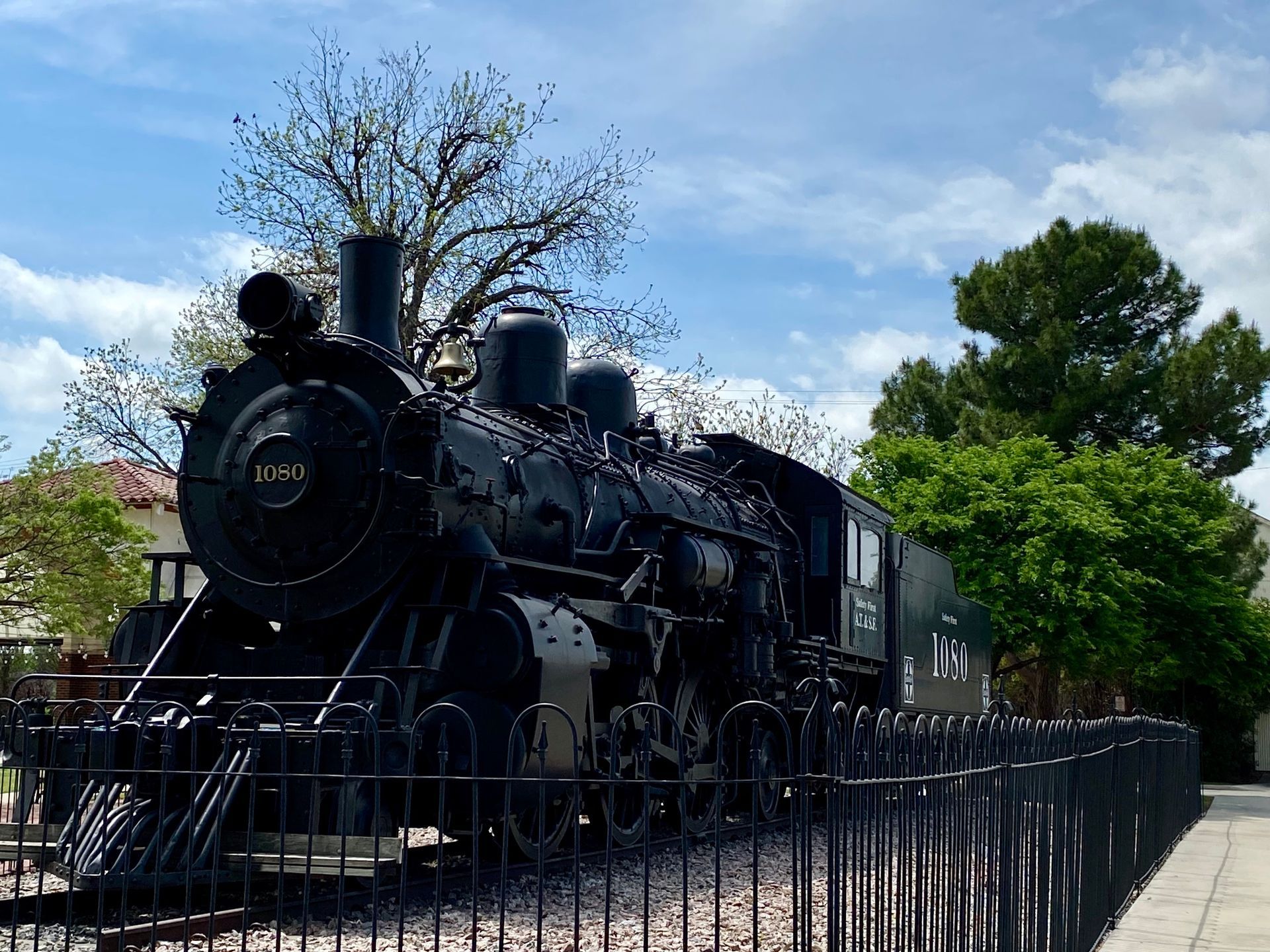 Historic 1902 Baldwin steam locomotive 1080 on display near Santa Fe Harvey House in Brownwood TX