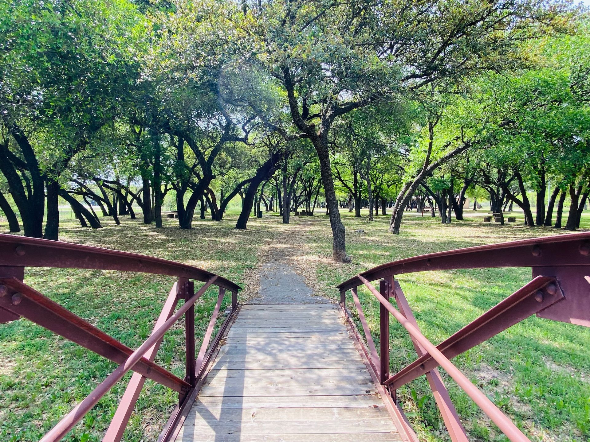Pedestrian bridge and nature path at Festival Park in Brownwood, Texas park and community recreation area