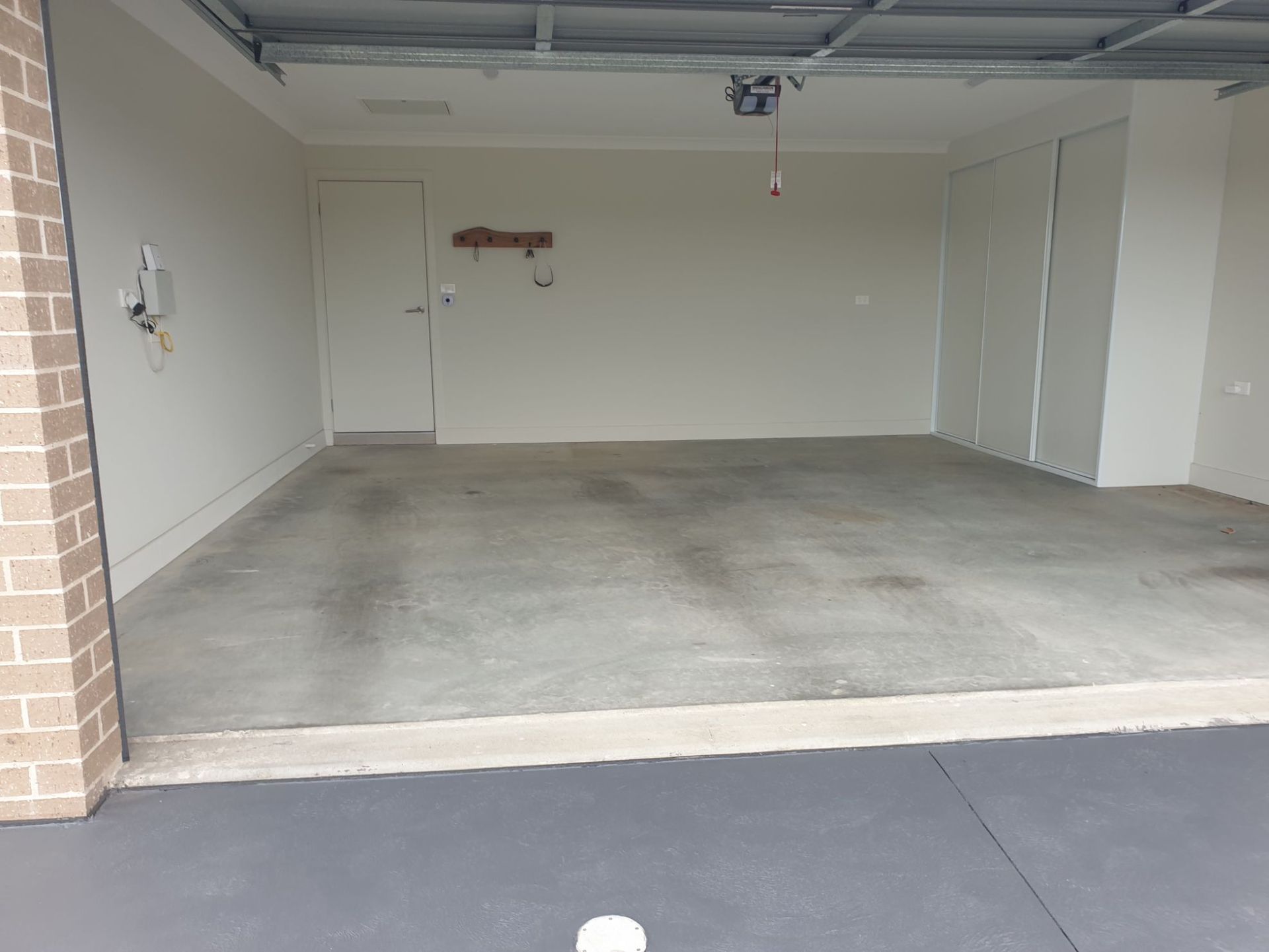 A Before Picture of An Epoxy Concrete Project In A Garage — Turn It Crete in St Georges Basin, NSW