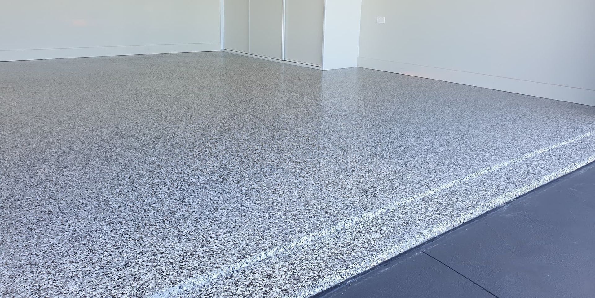 A House with A Metal Roof and A Driveway with A View of The Ocean — Turn It Crete in St Georges Basin, NSW