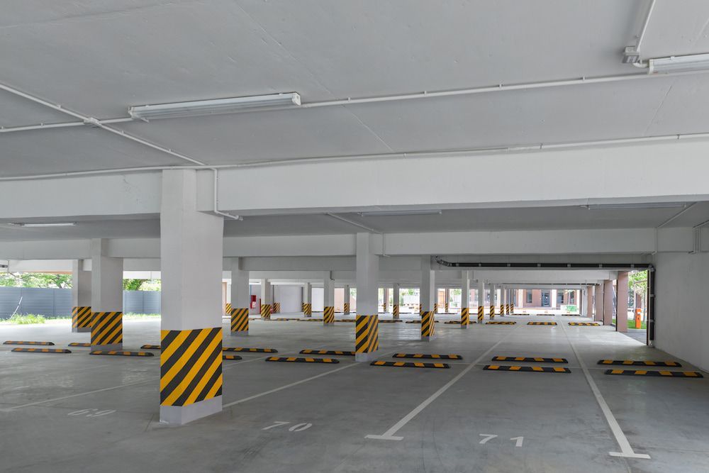 A Parking Garage With A Lot Of Parking Spaces And Columns — Turn It Crete in St Georges Basin, NSW