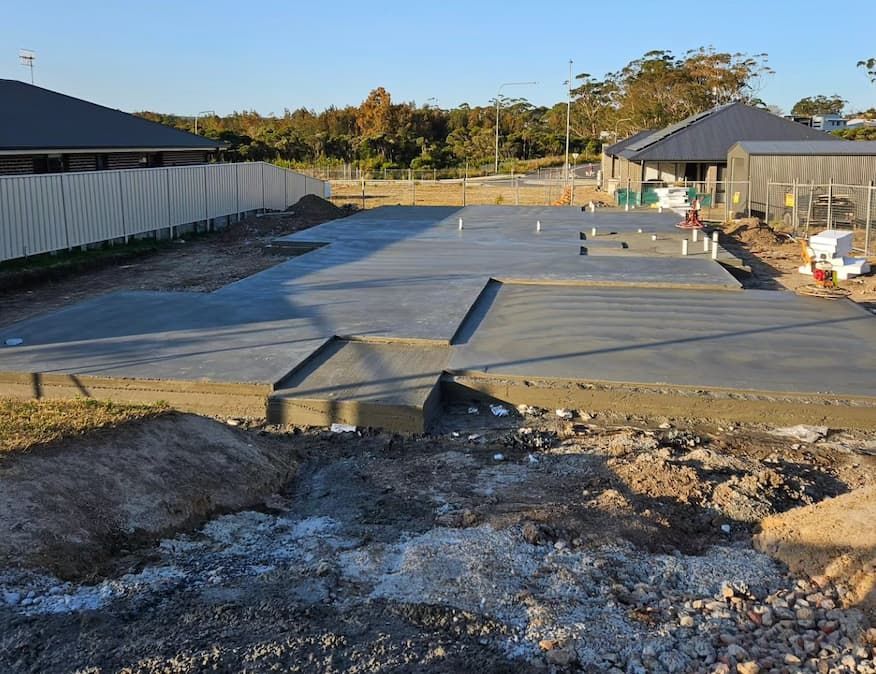 A Construction Site With A Concrete
Slab — Turn It Crete in St Georges Basin, NSW