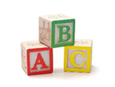 Building Blocks to a Brighter Future, LLC Three wooden blocks with the letters a b and c on them
