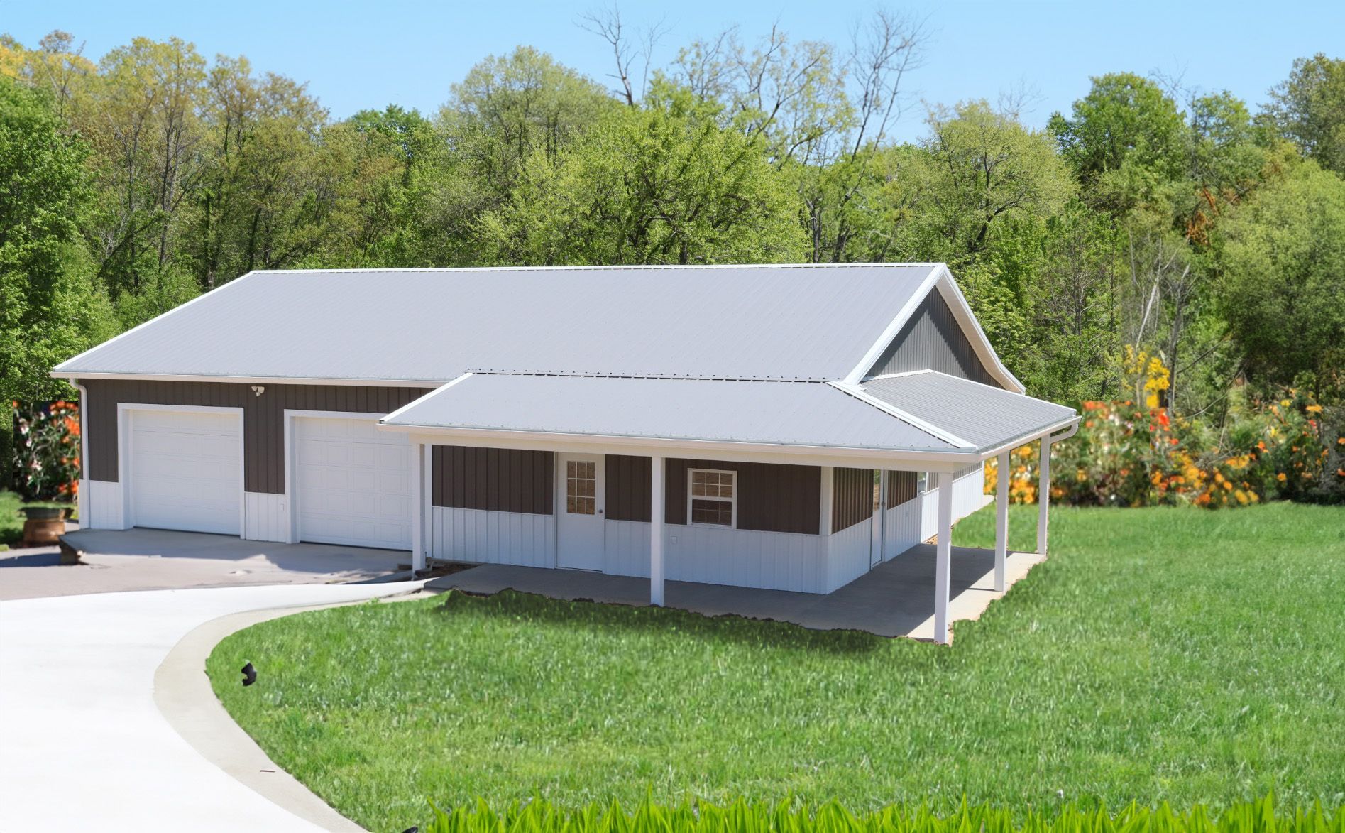 Single-story gray house with a covered porch, driveway, and green lawn in a wooded setting