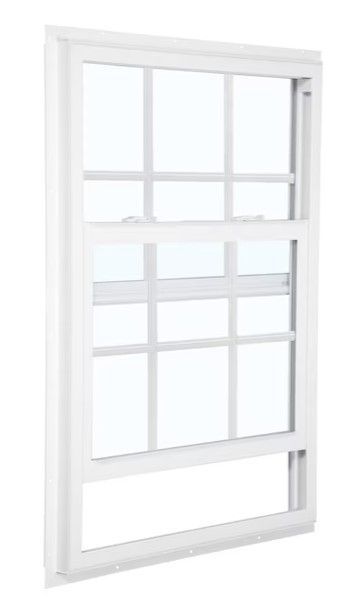 White-framed window with multiple rectangular panes and frosted glass