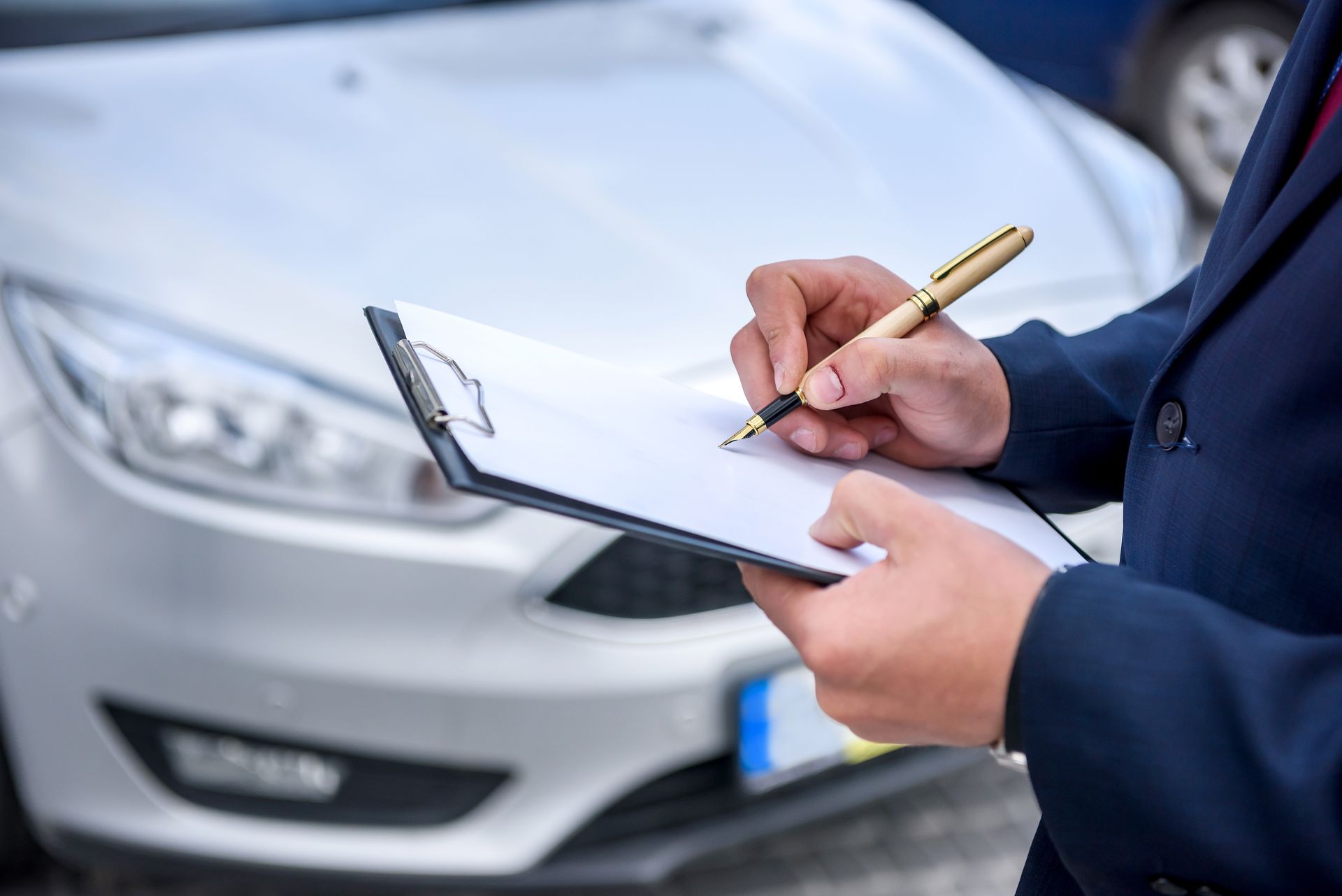 Person completing vehicle inspection