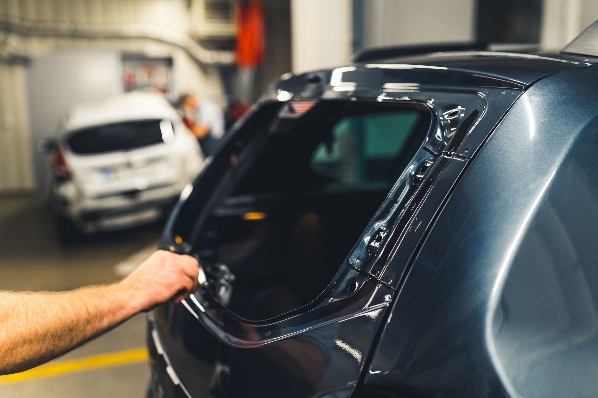 Technician Installing Window Tint Film
