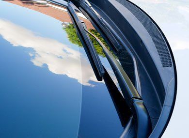 Windshield With Wiper Blades