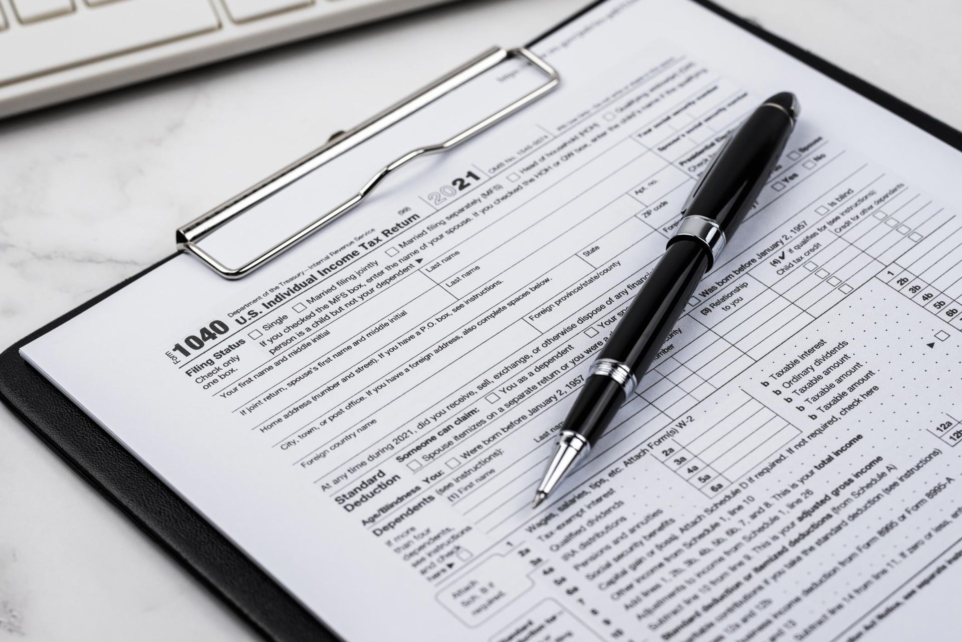 Tax Form And Pen — Venice, FL — Hough & Co CPA