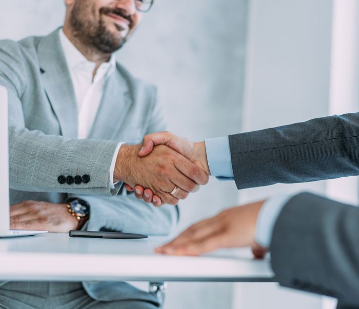 Men Shaking Hands — Venice, FL — Hough & Co CPA Men Shaking Hands — Venice, FL — Hough & Co CPA