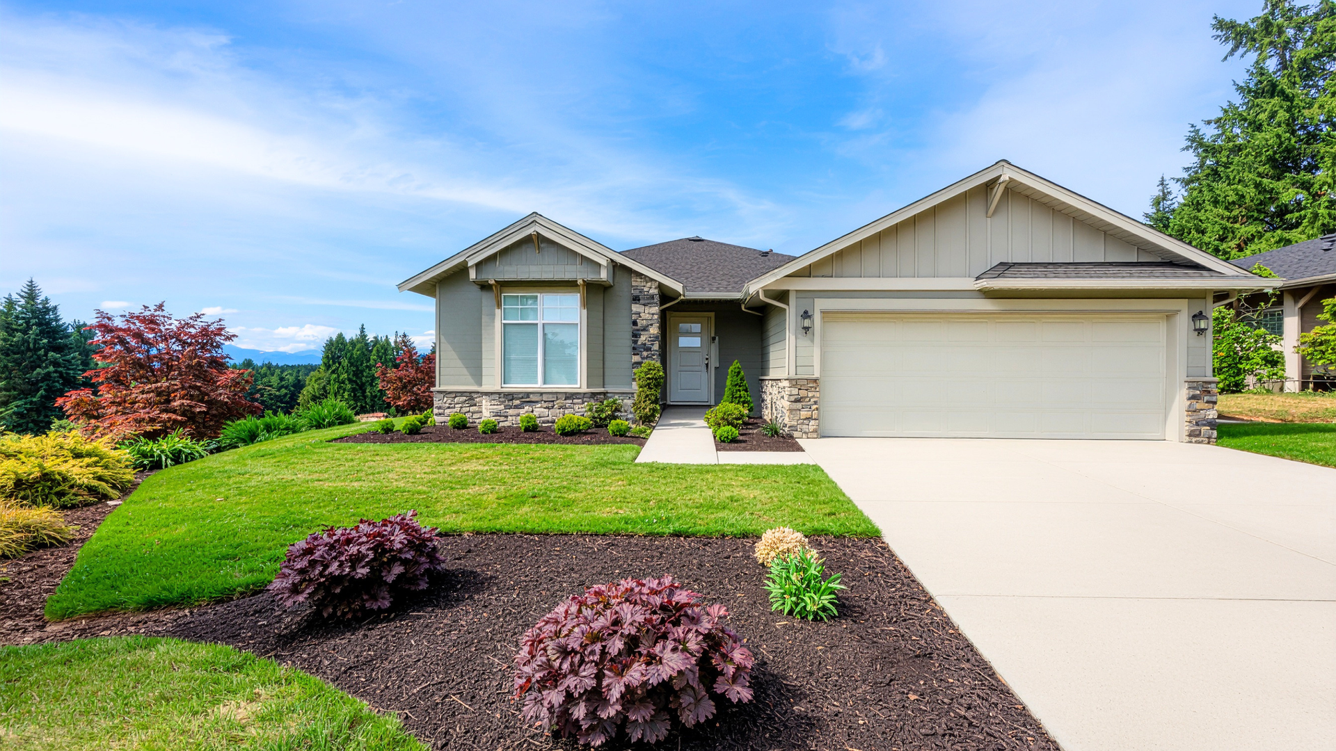 Residential concrete driveway replacement in Aurora featuring a clean new driveway and updated curb 