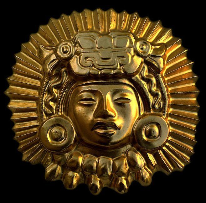Eine goldene Skulptur eines Mannesgesichts mit geschlossenen Augen