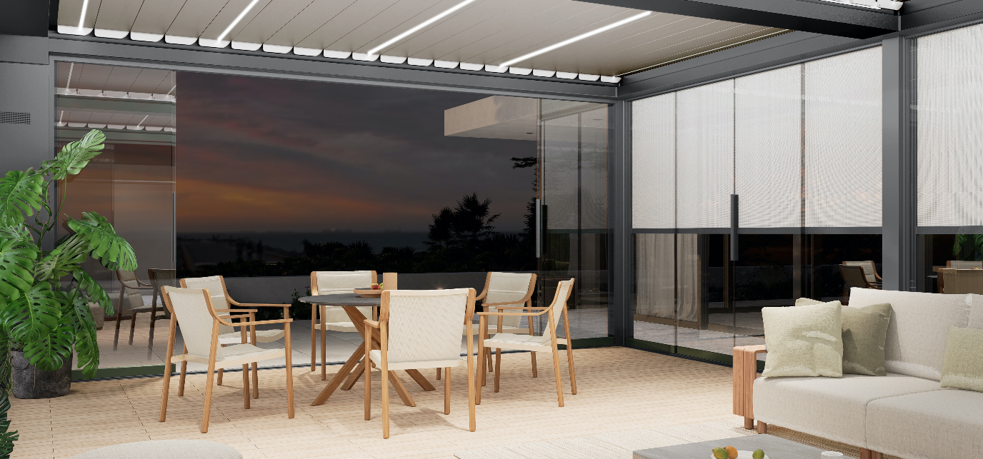 Modern patio with dining table and chairs under a covered pergola at sunset