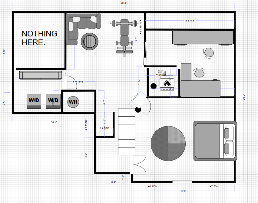 Floor plan of a small apartment with labeled rooms, furniture, and stairs.
