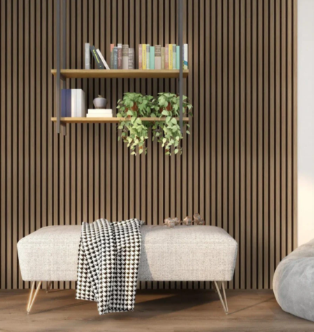Modern bench with checked throw in front of a slatted wood wall, shelf, and hanging plant