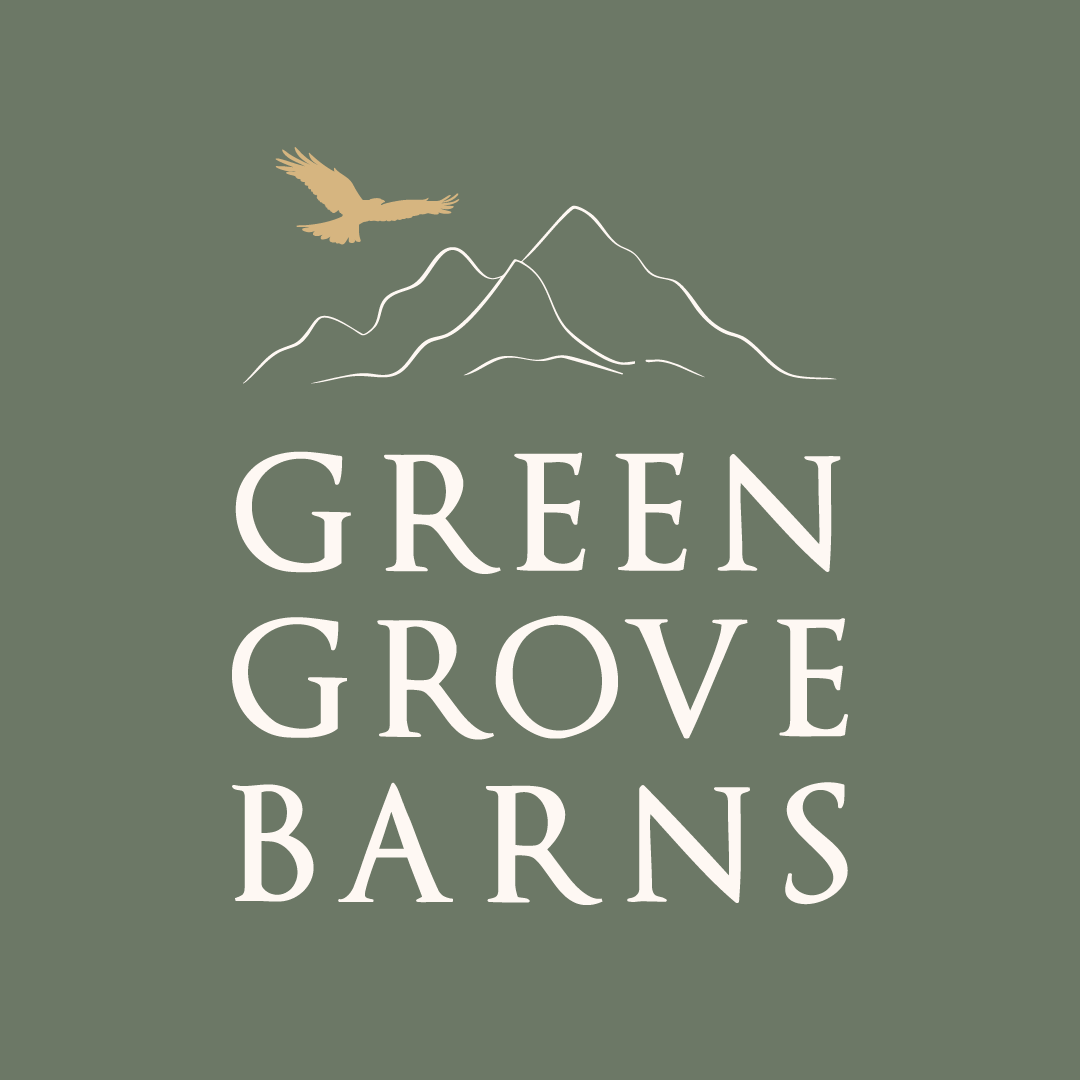 Green Grove Barns logo with mountain outline and flying bird.