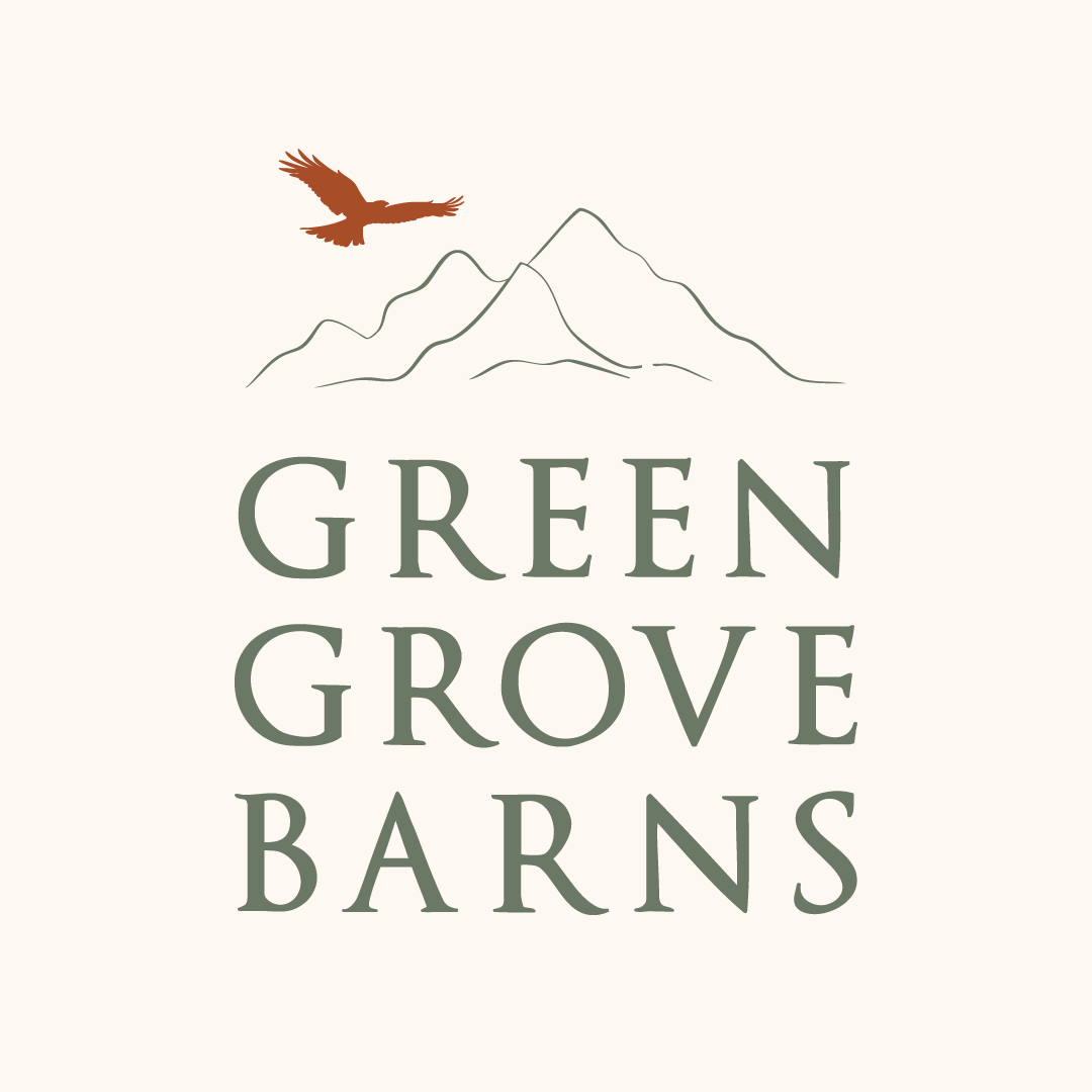Alternate Green Grove Barns logo in cream background with mountain and bird motif.