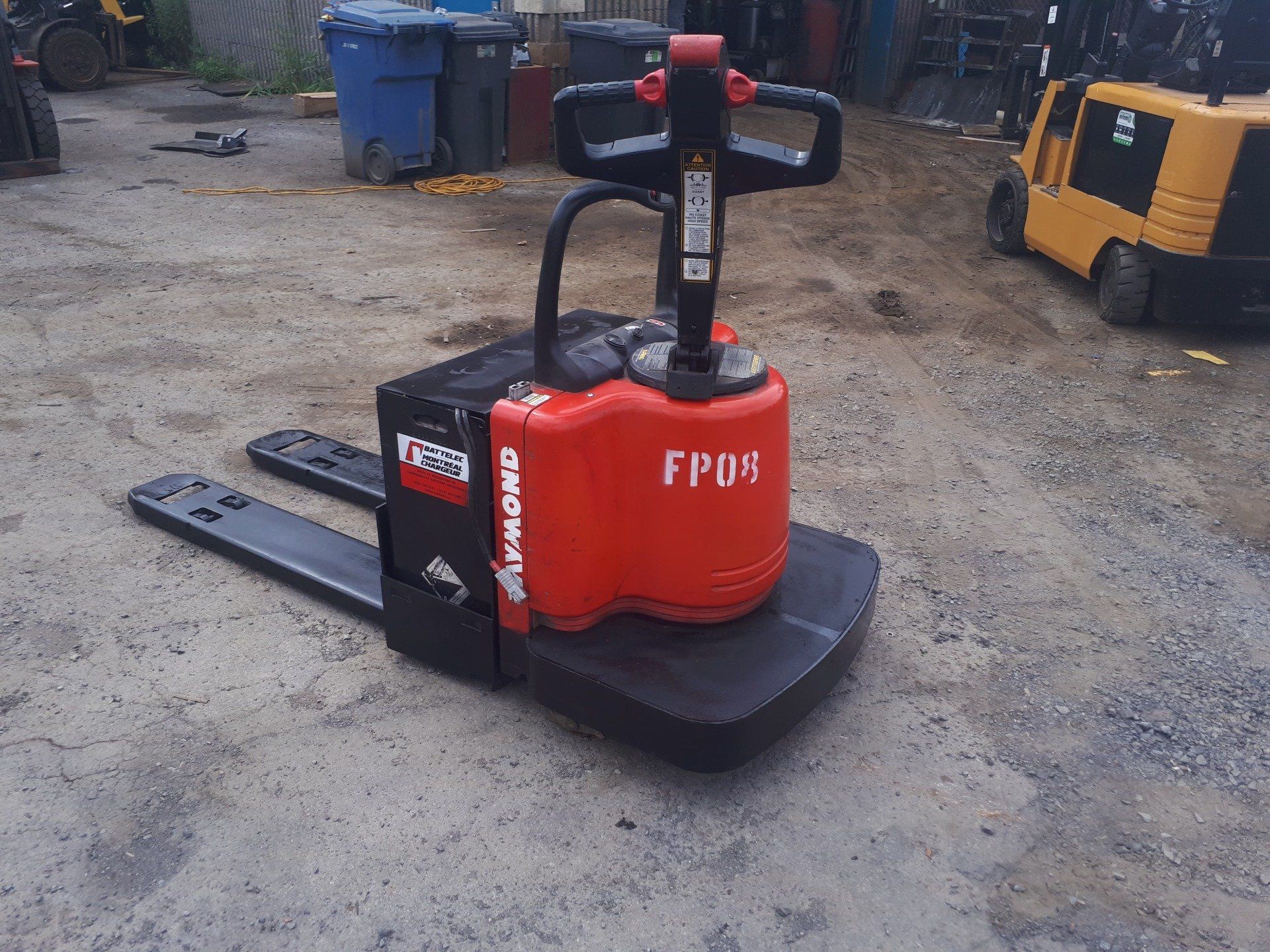 A red and black forklift that says fp04 on it
