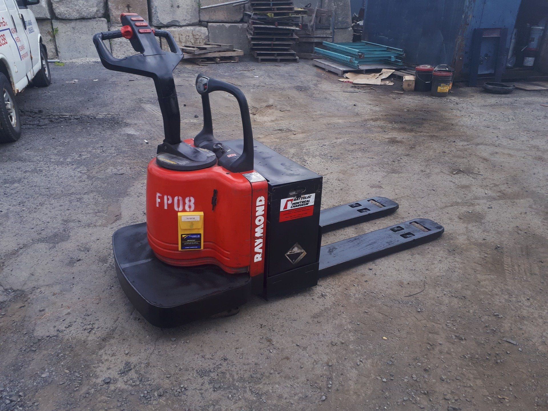 A red pallet truck with the word fp08 on it