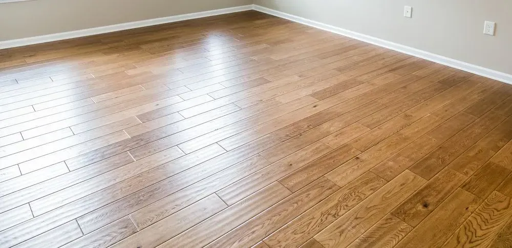 Hardwood Floor in a Room — Sly Bros in Grafton, NSW
