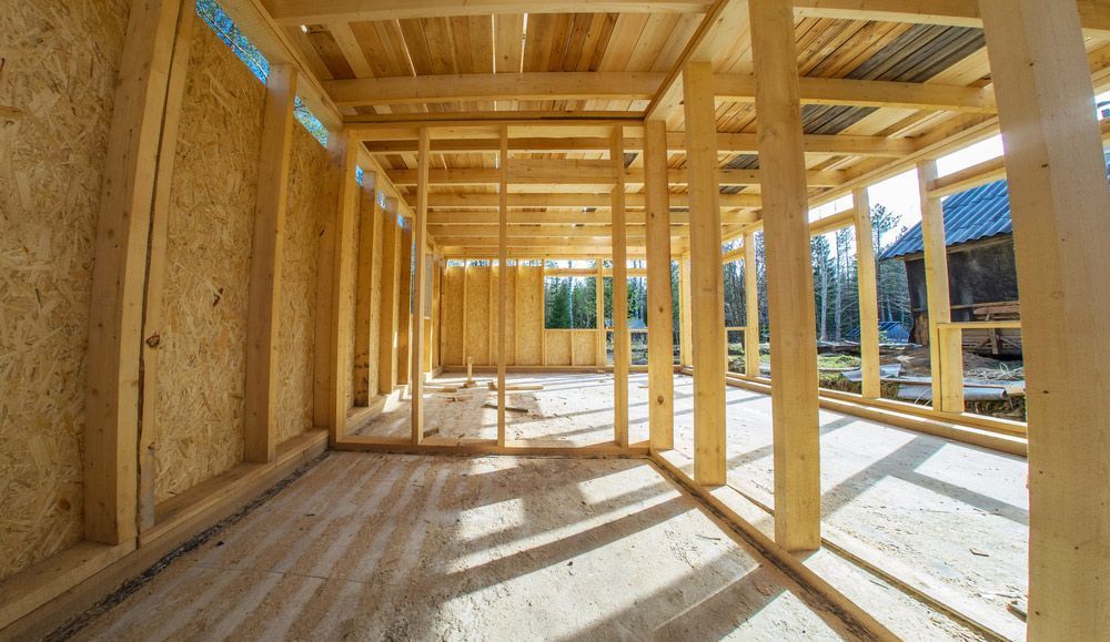 Wooden Building Frame Under Construction — Sly Bros in Woodburn, NSW